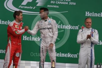 World © Octane Photographic Ltd. Mercedes AMG Petronas – Lewis Hamilton (1st), Scuderia Ferrari – Sebastian Vettel (2nd) and Williams Martini Racing, – Valtteri Bottas (3rd). Sunday 12th June 2016, F1 Canadian GP Podium, Circuit Gilles Villeneuve, Montreal, Canada. Digital Ref :1593LB1D4455