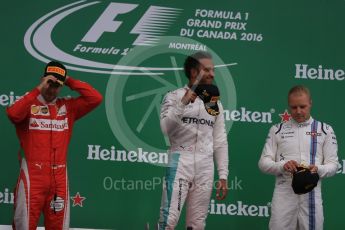 World © Octane Photographic Ltd. Mercedes AMG Petronas – Lewis Hamilton (1st), Scuderia Ferrari – Sebastian Vettel (2nd) and Williams Martini Racing, – Valtteri Bottas (3rd). Sunday 12th June 2016, F1 Canadian GP Podium, Circuit Gilles Villeneuve, Montreal, Canada. Digital Ref :1593LB1D4484