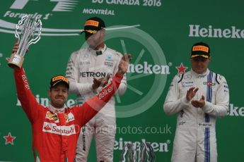 World © Octane Photographic Ltd. Mercedes AMG Petronas – Lewis Hamilton (1st), Scuderia Ferrari – Sebastian Vettel (2nd) and Williams Martini Racing, – Valtteri Bottas (3rd). Sunday 12th June 2016, F1 Canadian GP Podium, Circuit Gilles Villeneuve, Montreal, Canada. Digital Ref :1593LB1D4562