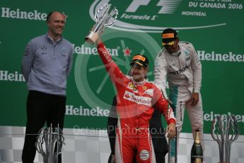 World © Octane Photographic Ltd. Mercedes AMG Petronas – Lewis Hamilton (1st) and Scuderia Ferrari – Sebastian Vettel (2nd) with Evan Short (Constructors’ Trophy). Sunday 12th June 2016, F1 Canadian GP Podium, Circuit Gilles Villeneuve, Montreal, Canada. Digital Ref :1593LB1D4573