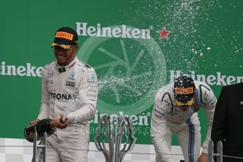 World © Octane Photographic Ltd. Mercedes AMG Petronas – Lewis Hamilton (1st) and Williams Martini Racing, – Valtteri Bottas (3rd). Sunday 12th June 2016, F1 Canadian GP Podium, Circuit Gilles Villeneuve, Montreal, Canada. Digital Ref :1593LB1D4620