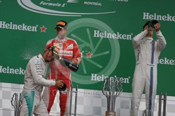 World © Octane Photographic Ltd. Mercedes AMG Petronas – Lewis Hamilton (1st), Scuderia Ferrari – Sebastian Vettel (2nd) and Williams Martini Racing, – Valtteri Bottas (3rd). Sunday 12th June 2016, F1 Canadian GP Podium, Circuit Gilles Villeneuve, Montreal, Canada. Digital Ref :1593LB1D4666