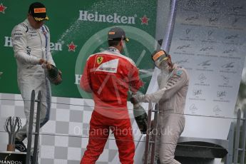 World © Octane Photographic Ltd. Mercedes AMG Petronas – Lewis Hamilton (1st), Scuderia Ferrari – Sebastian Vettel (2nd) and Williams Martini Racing, – Valtteri Bottas (3rd). Sunday 12th June 2016, F1 Canadian GP Podium, Circuit Gilles Villeneuve, Montreal, Canada. Digital Ref :1593LB1D4688