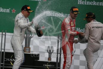 World © Octane Photographic Ltd. Mercedes AMG Petronas – Lewis Hamilton (1st), Scuderia Ferrari – Sebastian Vettel (2nd) and Williams Martini Racing, – Valtteri Bottas (3rd). Sunday 12th June 2016, F1 Canadian GP Podium, Circuit Gilles Villeneuve, Montreal, Canada. Digital Ref :1593LB1D4698