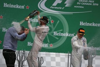 World © Octane Photographic Ltd. Mercedes AMG Petronas – Lewis Hamilton (1st) with Evan Short (Constructors’ Trophy). Sunday 12th June 2016, F1 Canadian GP Podium, Circuit Gilles Villeneuve, Montreal, Canada. Digital Ref :1593LB1D4716