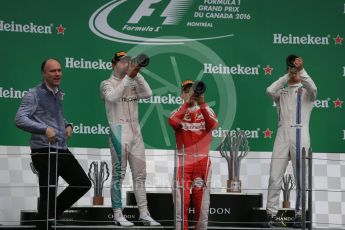 World © Octane Photographic Ltd. Mercedes AMG Petronas – Lewis Hamilton (1st), Scuderia Ferrari – Sebastian Vettel (2nd) and Williams Martini Racing, – Valtteri Bottas (3rd) with Evan Short (Constructors’ Trophy). Sunday 12th June 2016, F1 Canadian GP Podium, Circuit Gilles Villeneuve, Montreal, Canada. Digital Ref :1593LB1D4785