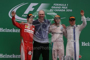 World © Octane Photographic Ltd. Mercedes AMG Petronas – Lewis Hamilton (1st), Scuderia Ferrari – Sebastian Vettel (2nd) and Williams Martini Racing, – Valtteri Bottas (3rd) with Evan Short (Constructors’ Trophy). Sunday 12th June 2016, F1 Canadian GP Podium, Circuit Gilles Villeneuve, Montreal, Canada. Digital Ref :1593LB1D4827