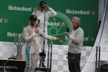 World © Octane Photographic Ltd. Mercedes AMG Petronas – Lewis Hamilton (1st) with Michael Douglas. Sunday 12th June 2016, F1 Canadian GP Podium, Circuit Gilles Villeneuve, Montreal, Canada. Digital Ref :1593LB1D4879