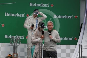 World © Octane Photographic Ltd. Mercedes AMG Petronas – Lewis Hamilton (1st) with Michael Douglas. Sunday 12th June 2016, F1 Canadian GP Podium, Circuit Gilles Villeneuve, Montreal, Canada. Digital Ref :1593LB1D4884