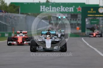 World © Octane Photographic Ltd. Mercedes AMG Petronas W07 Hybrid – Lewis Hamilton and Scuderia Ferrari SF16-H – Sebastian Vettel. Saturday 11th June 2016, F1 Canadian GP Qualifying, Circuit Gilles Villeneuve, Montreal, Canada. Digital Ref :1589LB1D1479