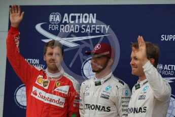 World © Octane Photographic Ltd. Mercedes AMG Petronas W07 Hybrid – Lewis Hamilton and Nico Rosberg and Scuderia Ferrari SF16-H – Sebastian Vettel. Saturday 11th June 2016, F1 Canadian GP Qualifying Parc Ferme, Circuit Gilles Villeneuve, Montreal, Canada. Digital Ref :1589LB1D2131