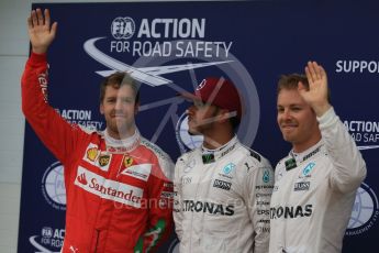 World © Octane Photographic Ltd. Mercedes AMG Petronas W07 Hybrid – Lewis Hamilton and Nico Rosberg and Scuderia Ferrari SF16-H – Sebastian Vettel. Saturday 11th June 2016, F1 Canadian GP Qualifying Parc Ferme, Circuit Gilles Villeneuve, Montreal, Canada. Digital Ref :1589LB1D2140