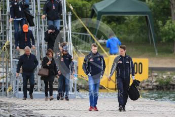 World © Octane Photographic Ltd. Scuderia Toro Rosso – Daniil Kvyat and Red Bull Racing – Daniel Ricciardo. Sunday 12th June 2016, F1 Canadian GP Paddock, Circuit Gilles Villeneuve, Montreal, Canada. Digital Ref :1590LB1D2679