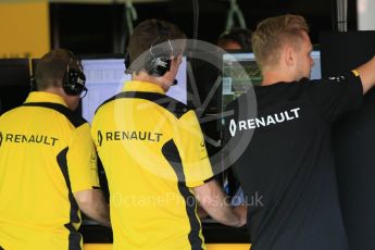 World © Octane Photographic Ltd. Renault Sport F1 Team RS16 - Kevin Magnussen studying the telematry. Tuesday 17th May 2016, F1 Spanish GP In-season testing, Circuit de Barcelona Catalunya, Spain. Digital Ref :1555CB1D3350
