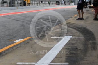 World © Octane Photographic Ltd. tyre marks in the pitlane. Tuesday 17th May 2016, F1 Spanish GP In-season testing, Circuit de Barcelona Catalunya, Spain. Digital Ref :1555CB1D3389