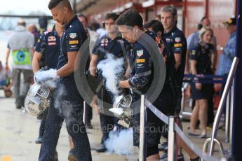 World © Octane Photographic Ltd. Red Bull Racing RB12 – pit crew ready for the car's return. Tuesday 17th May 2016, F1 Spanish GP In-season testing, Circuit de Barcelona Catalunya, Spain. Digital Ref :1555CB1D3425