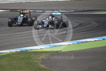 World © Octane Photographic Ltd. Mercedes AMG Petronas W07 Hybrid – Lewis Hamilton and Sahara Force India VJM09 - Nico Hulkenberg. Friday 29th July 2016, F1 German GP Practice 2, Hockenheim, Germany. Digital Ref : 1661CB1D1451