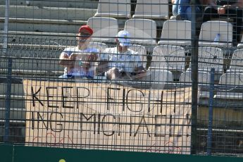 World © Octane Photographic Ltd. "Keep Fighting Michael" flag. Saturday 30th July 2016, F1 German GP Practice 3, Hockenheim, Germany. Digital Ref :1665CB1D1699