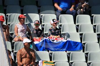 World © Octane Photographic Ltd. Young Red Bull Racing/Max Verstappen fans in the grandstand. Saturday 30th July 2016, F1 German GP Practice 3, Hockenheim, Germany. Digital Ref :1665CB1D1795