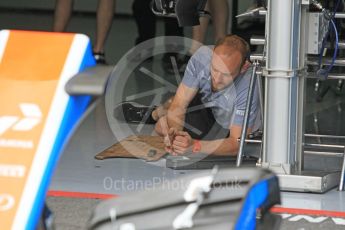 World © Octane Photographic Ltd. Manor Racing mechanic at work. Thursday 28th July 2016, F1 German GP Set up, Hockenheim, Germany. Digital Ref :1658CB1D0475
