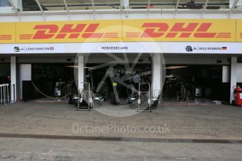 World © Octane Photographic Ltd. Mercedes AMG Petronas garage – Lewis Hamilton and Nico Rosberg. Thursday 28th July 2016, F1 German GP Set up, Hockenheim, Germany. Digital Ref :1658CB5D8726