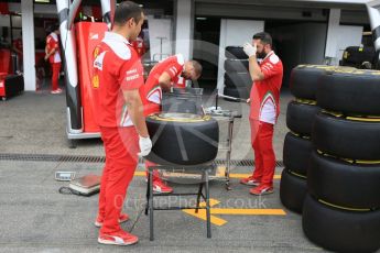 World © Octane Photographic Ltd. Scuderia Ferrari mechanics with Pirelli Soft (Yellow) tyres. Thursday 28th July 2016, F1 German GP Set up, Hockenheim, Germany. Digital Ref :1658CB5D8856