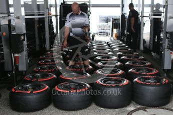 World © Octane Photographic Ltd. McLaren Honda mechanics with Pirelli Supersoft (Red) tyres. Thursday 28th July 2016, F1 German GP Set up, Hockenheim, Germany. Digital Ref :1658CB5D8860