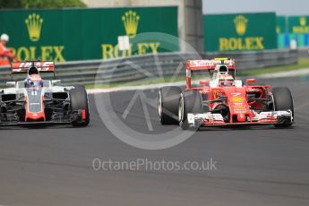World © Octane Photographic Ltd. Scuderia Ferrari SF16-H – Kimi Raikkonen and Haas F1 Team VF-16 – Romain Grosjean. Saturday 23rd July 2016, F1 Hungarian GP Practice 3, Hungaroring, Hungary. Digital Ref :1647CB1D7613