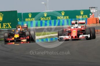 World © Octane Photographic Ltd. Scuderia Ferrari SF16-H – Sebastian Vettel and Red Bull Racing RB12 – Daniel Ricciardo. Saturday 23rd July 2016, F1 Hungarian GP Practice 3, Hungaroring, Hungary. Digital Ref :1647CB1D7909