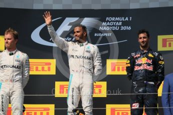 World © Octane Photographic Ltd. Mercedes AMG Petronas W07 Hybrid – Lewis Hamilton and Nico Rosberg and Red Bull Racing RB12 – Daniel Ricciardo. Sunday 24th July 2016, F1 Hungarian GP Podium, Hungaroring, Hungary. Digital Ref :