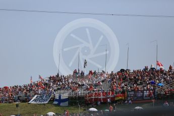 World © Octane Photographic Ltd. Crowds with Kimi for President" flag. Sunday 24th July 2016, F1 Hungarian GP, Hungaroring, Hungary. Digital Ref :