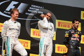 World © Octane Photographic Ltd. Mercedes AMG Petronas W07 Hybrid – Lewis Hamilton and Nico Rosberg and Red Bull Racing RB12 – Daniel Ricciardo. Sunday 24th July 2016, F1 Hungarian GP Podium, Hungaroring, Hungary. Digital Ref :