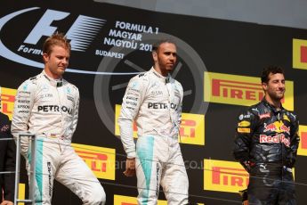 World © Octane Photographic Ltd. Mercedes AMG Petronas W07 Hybrid – Lewis Hamilton and Nico Rosberg and Red Bull Racing RB12 – Daniel Ricciardo. Sunday 24th July 2016, F1 Hungarian GP Podium, Hungaroring, Hungary. Digital Ref :