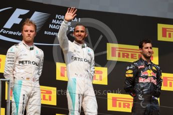 World © Octane Photographic Ltd. Mercedes AMG Petronas W07 Hybrid – Lewis Hamilton and Nico Rosberg and Red Bull Racing RB12 – Daniel Ricciardo. Sunday 24th July 2016, F1 Hungarian GP Podium, Hungaroring, Hungary. Digital Ref :