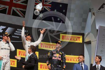 World © Octane Photographic Ltd. Mercedes AMG Petronas W07 Hybrid – Lewis Hamilton and Nico Rosberg and Red Bull Racing RB12 – Daniel Ricciardo. Sunday 24th July 2016, F1 Hungarian GP Podium, Hungaroring, Hungary. Digital Ref :