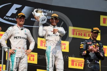 World © Octane Photographic Ltd. Mercedes AMG Petronas W07 Hybrid – Lewis Hamilton and Nico Rosberg and Red Bull Racing RB12 – Daniel Ricciardo. Sunday 24th July 2016, F1 Hungarian GP Podium, Hungaroring, Hungary. Digital Ref :