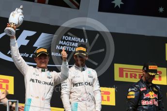 World © Octane Photographic Ltd. Mercedes AMG Petronas W07 Hybrid – Lewis Hamilton and Nico Rosberg and Red Bull Racing RB12 – Daniel Ricciardo. Sunday 24th July 2016, F1 Hungarian GP Podium, Hungaroring, Hungary. Digital Ref :