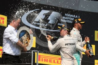 World © Octane Photographic Ltd. Mercedes AMG Petronas W07 Hybrid – Lewis Hamilton and Nico Rosberg. Sunday 24th July 2016, F1 Hungarian GP Podium, Hungaroring, Hungary. Digital Ref :