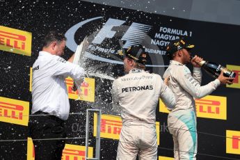 World © Octane Photographic Ltd. Mercedes AMG Petronas W07 Hybrid – Lewis Hamilton and Nico Rosberg. Sunday 24th July 2016, F1 Hungarian GP Podium, Hungaroring, Hungary. Digital Ref :