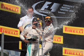 World © Octane Photographic Ltd. Mercedes AMG Petronas W07 Hybrid – Lewis Hamilton and Nico Rosberg. Sunday 24th July 2016, F1 Hungarian GP Podium, Hungaroring, Hungary. Digital Ref :