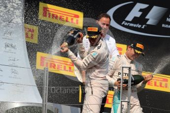 World © Octane Photographic Ltd. Mercedes AMG Petronas W07 Hybrid – Lewis Hamilton and Nico Rosberg. Sunday 24th July 2016, F1 Hungarian GP Podium, Hungaroring, Hungary. Digital Ref :
