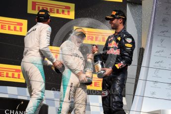 World © Octane Photographic Ltd. Mercedes AMG Petronas W07 Hybrid – Lewis Hamilton and Nico Rosberg and Red Bull Racing RB12 – Daniel Ricciardo. Sunday 24th July 2016, F1 Hungarian GP Podium, Hungaroring, Hungary. Digital Ref :