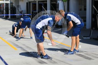 World © Octane Photographic Ltd. Williams Martini Racing pit team marking out the pit box. Thursday 21st July 2016, F1 Hungarian GP Pitlane, Hungaroring, Hungary. Digital Ref : 1636CB1D5369