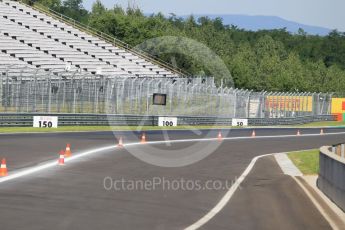 World © Octane Photographic Ltd. Resurfaced circuit. Thursday 21st July 2016, F1 Hungarian GP Pitlane exit, Hungaroring, Hungary. Digital Ref : 1636CB1D5442