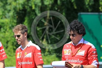 World © Octane Photographic Ltd. Scuderia Ferrari SF16-H – Sebastian Vettel and Edoardo Brosco (Vehicle Dynamicist). Thursday 21st July 2016, F1 Hungarian GP trackwalk, Hungaroring, Hungary. Digital Ref :1636CB1D5477