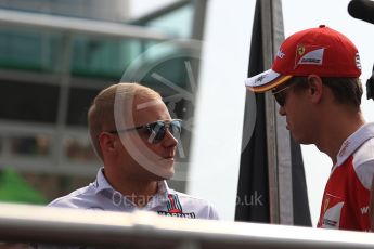 World © Octane Photographic Ltd. Scuderia Ferrari SF16-H – Sebastian Vettel and Williams Martini Racing, Williams Mercedes FW38 – Valtteri Bottas. Sunday 4th September 2016, F1 Italian GP Drivers’ Parade, Monza, Italy. Digital Ref :1709LB1D0256