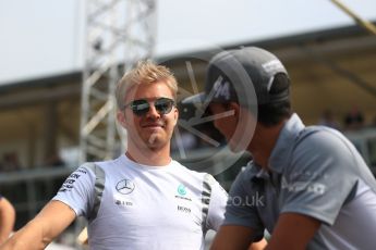 World © Octane Photographic Ltd. Mercedes AMG Petronas W07 Hybrid – Nico Rosberg and Manor Racing MRT05 - Pascal Wehrlein. Sunday 4th September 2016, F1 Italian GP Drivers’ Parade, Monza, Italy. Digital Ref :1709LB1D0259