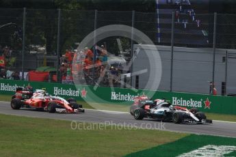 World © Octane Photographic Ltd. The Mercedes AMG Petronas W07 Hybrid of Nico Rosberg leads the 2 Ferraris of Vettel and Raikkonen and the Williams of Bottas into the 1st corner on the opening lap. Sunday 4th September 2016, F1 Italian GP Race, Monza, Italy. Digital Ref :1710LB2D6829