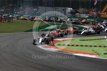 World © Octane Photographic Ltd. The Mercedes AMG Petronas W07 Hybrid of Nico Rosberg leads the 2 Ferraris of Vettel and Raikkonen and the Williams of Bottas into the 2nd chicane apex of the opening lap. Sunday 4th September 2016, F1 Italian GP Race, Monza, Italy. Digital Ref :1710LB2D6849