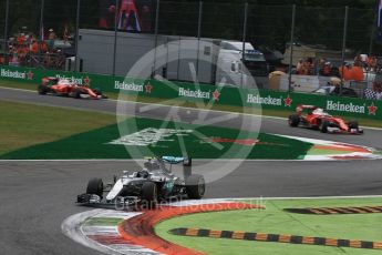 World © Octane Photographic Ltd. Mercedes AMG Petronas W07 Hybrid – Nico Rosberg , Scuderia Ferrari SF16-H – Sebastian Vettel and Kimi Raikkonen. Sunday 4th September 2016, F1 Italian GP Race, Monza, Italy. Digital Ref :1710LB2D6990